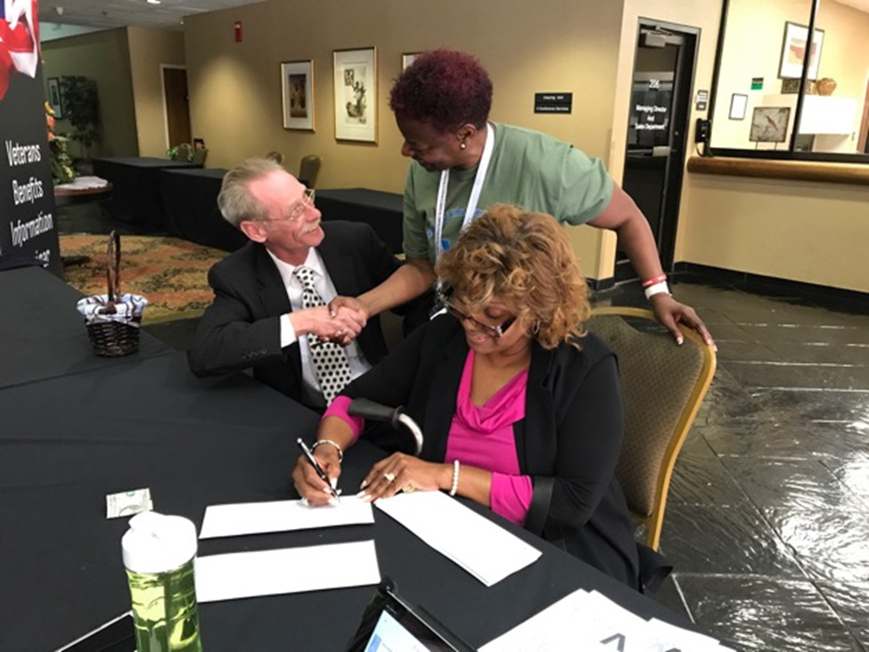 AVWA co-founder Dionne Archibald welcomes military veteran couple seeking information about their VA benefits and entitlements.